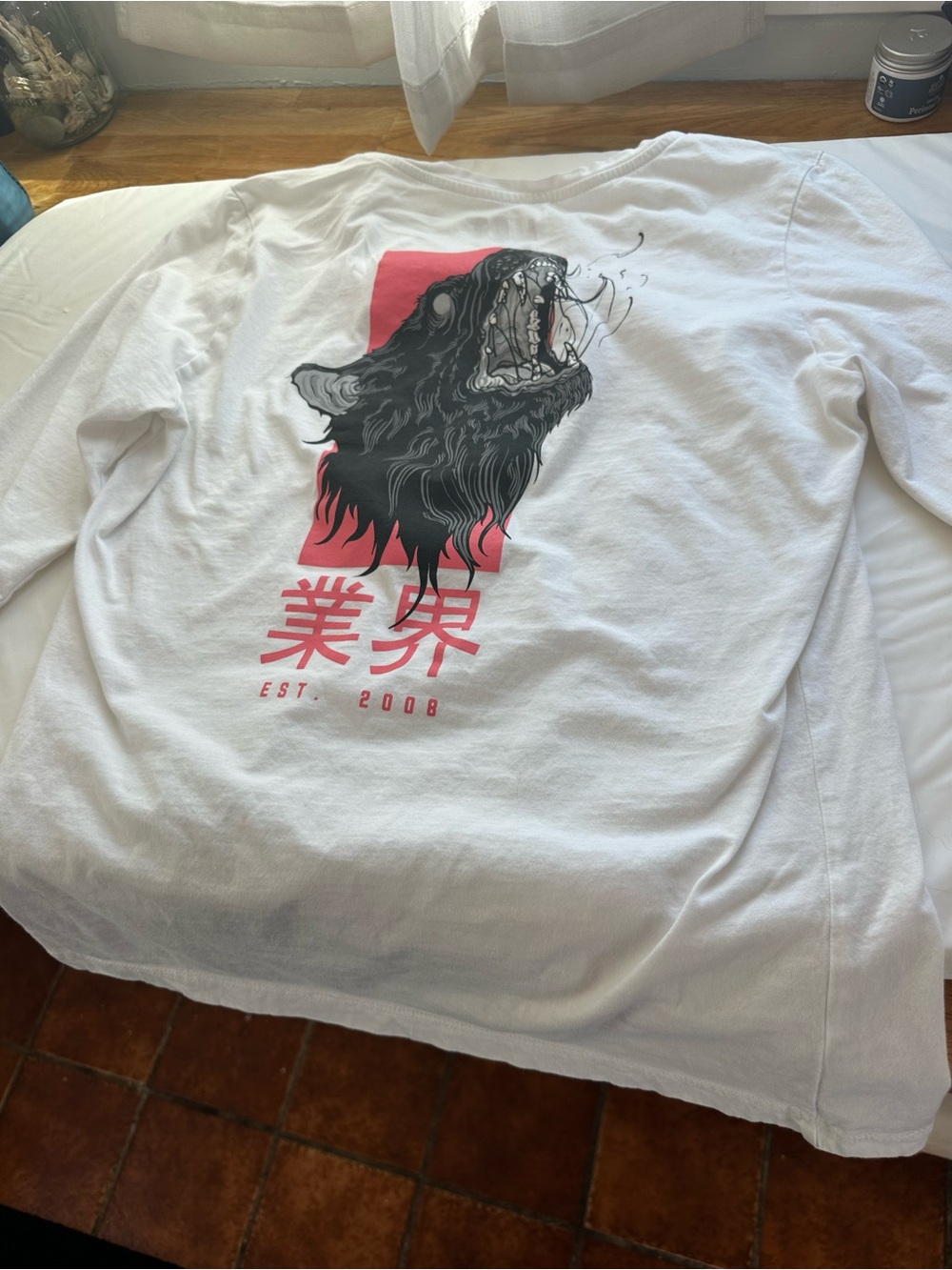 White Long Sleeve Graphic Tee with Black Wolf and Pink Accent